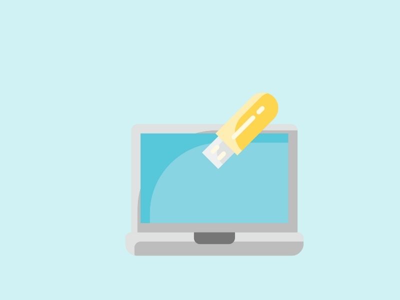 ノートPCにUSBメモリを差しているイラスト