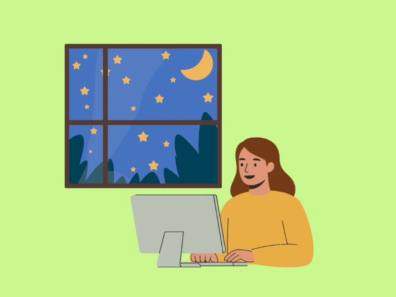 夜に静かにキーボードを打つシーン