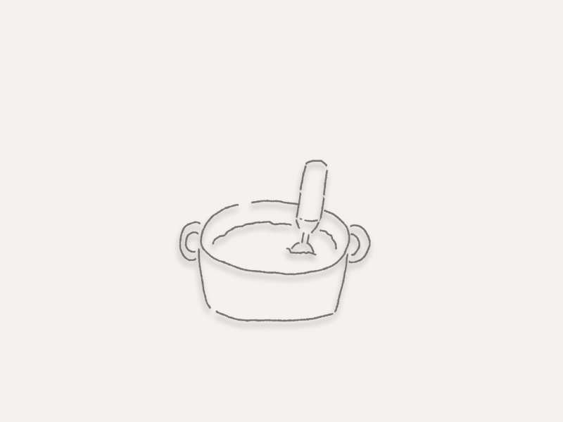 鍋の中でブレンダーを使っている様子